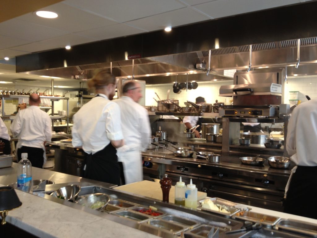 The kitchen, from our awesome seats. Chef Klein in action on the right.