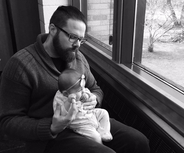 My husband and our daughter enjoying a quiet moment at our Synagogue. 