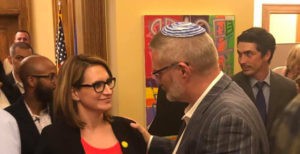 Minnesota Lt. Gov. Peggy Flanagan and Rabbi Michael Adam Latz at the Iftar in the Attorney General's office in the State Capitol on the first night of Ramadan.