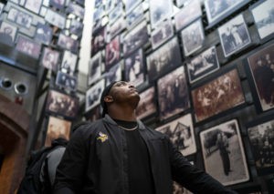 Fullback C.J. Ham takes in the Tower of Faces at the Holocaust Museum (Photo Courtesy the Minnesota Vikings).