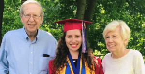 Sara Shiff flanked by her grandparents, Byron and Barbara Schneider