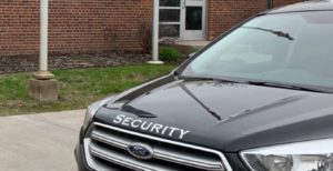 security vehicle outside of building.