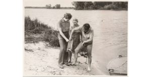 A photograph of the author’s father and grandparents fishing along the Dnieper River.