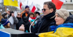 JCRC Executive Director Steve Hunegs and Luda Anastazievsky, chair of the Minnesota Ukrainian American Advocacy Committee, at the March 6 #StandWithUkraineMN rally at the Minnesota Capitol. (Ethan Roberts Photography/JCRC)