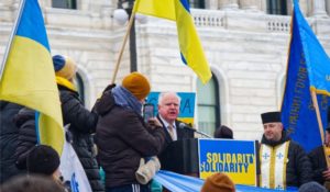 Minnesota Gov. Tim Walz was one of the speakers at The crowd at the #StandWithUkraineMN rally March 6 at the State Capitol. (TC Jewfolk Photo by Lev Gringauz)