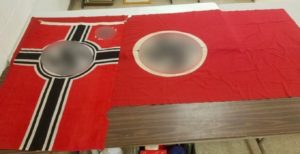 These Nazi flags were among the nine lots of Third Reich memorabilia sold at Luther Auctions in North St. Paul last week.