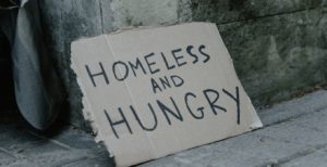 hungry and homeless sign