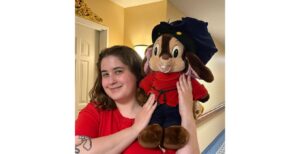 Sarah Buchlaw, is the Decriminalizing Communities Organizer at Jewish Community Action with her stuffed Fievel Mouskowitz.