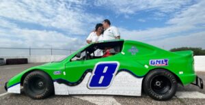 Thomas Poretsky in his racecar with his parents, Mary and Solomon, at Elko Speedway. (Photo by Lonny Goldsmith/TC Jewfolk)