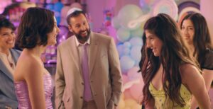 (L to R) Idina Menzel as Bree Friedman, Samantha Lorraine as Lydia Rodriguez Katz, Adam Sandler as Danny Friedman, Sunny Sandler as Stacy Friedman and Sadie Sandler as Ronnie Friedman in "You Are So Not Invited To My Bat Mitzvah." Courtesy of Netflix © 2023.