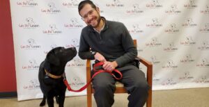 Rabbi Dov Ber Smith with his assistance dog, Cinco.