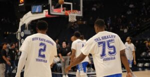 Maccabi Ra'anana warming up in shirts calling attention to kidnapped Israelis. (Photo by Lev Gringauz/TC Jewfolk).