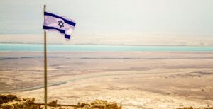 Israel flag on top of Masada.