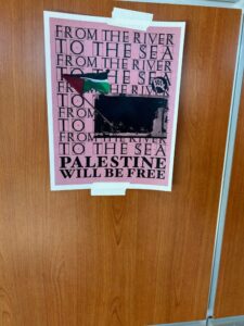 A poster reading "From the river to the sea, Palestine will be free" in a University of Minnesota class building. (Photo by Elise Long).