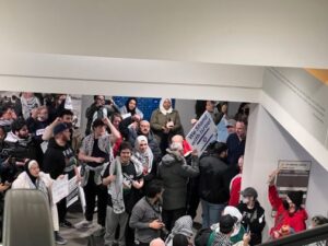 Israel supporters were shouted at as they tried to leave the Thursday, Jan. 25 meeting where a Minneapolis City Council ceasefire was approved. (Photo by Lonny Goldsmith/TC Jewfolk).