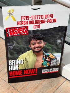 A poster of Hersh Goldberg-Polin, taken hostage by Hamas on Oct. 7, at Ben Gurion Airport in Tel Aviv. (Photo by Lonny Goldsmith/TC Jewfolk).