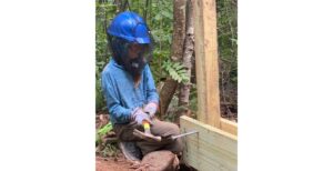 Aria Silberglitt doing work on a project on the Superior Hiking Trail as part of her bat mitzvah project. (Courtesy)