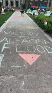 Chalk reading "Victory To Al-Aqsa Flood" on the sidewalk on Northrup Mall on the University of Minnesota campus. Al-Aqsa Flood is what Hamas called the Oct. 7 attack on Israel.