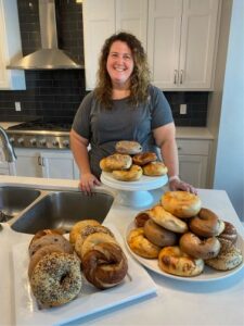 Jodi George, and piles of her Jersey Girl Bagels. (courtesy)