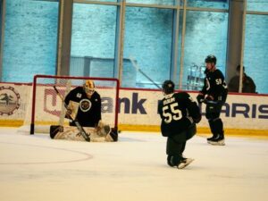 Zeev Buium takes a shot at Colorado College goalie and Minnesota Wild development camp invitee Kaidan Mbereko. (Lonny Goldsmith/TC Jewfolk)