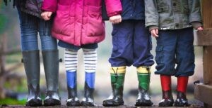 kids in rainboots Photo by Ben Wicks on Unsplash