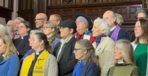 Rabbi Max Davis of Darchei Noam (middle, with cap) and Rabbi Lynn Liberman (to Davis's right), the Jewish community chaplain at St. Paul Jewish Federation. (Lonny Goldsmith/TC Jewfolk)