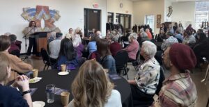 Jewfolk Executive Director Libby Parker talks to the crowd to kickoff the 2026 Engage! Day of Jewish Learning.