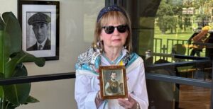 Jackie Sondell holds 1847 watercolor miniature of Carl Graf Gleispach, painted by Albert Theer. It belogned to the father of her uncle's wife, and was taken by the Nazis in 1940 from him in Vienna, Austria.